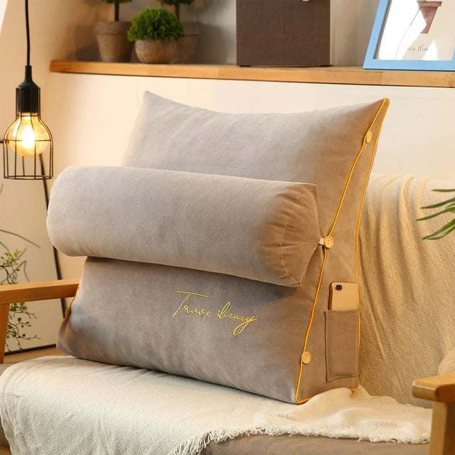 "Keilförmiges Rückenstützkissen mit ergonomischem Design in Anthrazit. Weiches Material und praktische Seitentaschen."