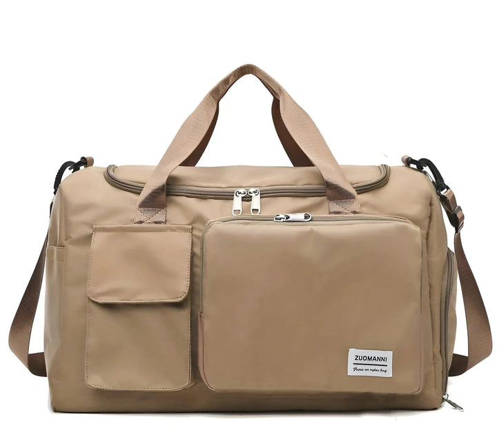 Khaki Reisetasche mit mehreren Fächern, robustem Stoff, verstellbarem Schultergurt.