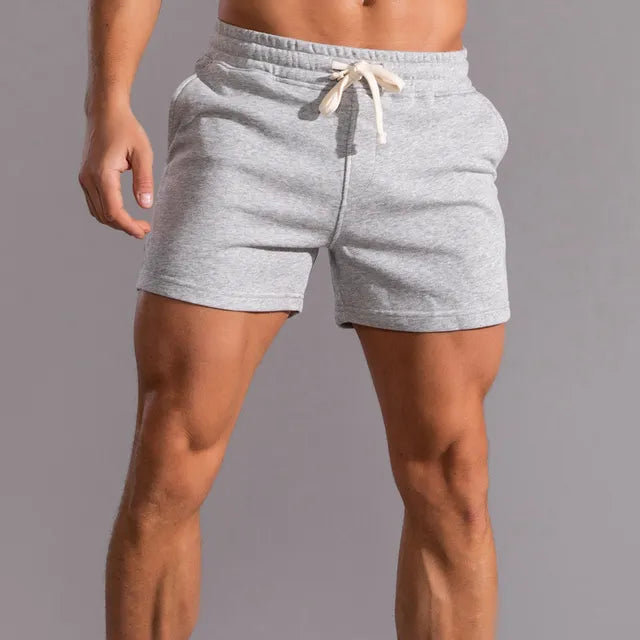 "Klassische Herren Baumwoll-Shorts in Beige mit zeitlosem Design, ideal für lässige Anlässe und warmes Wetter, Seitenansicht.
