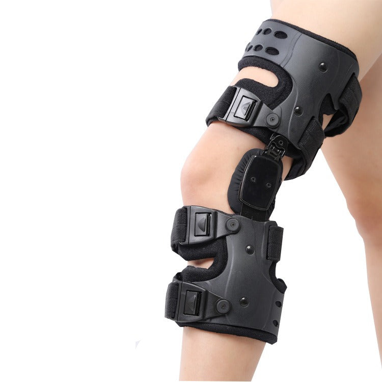 "Kniebandage seitlich in Schwarz, verstellbar für optimale Stabilität und Komfort, geeignet für Sport und Rehabilitation."