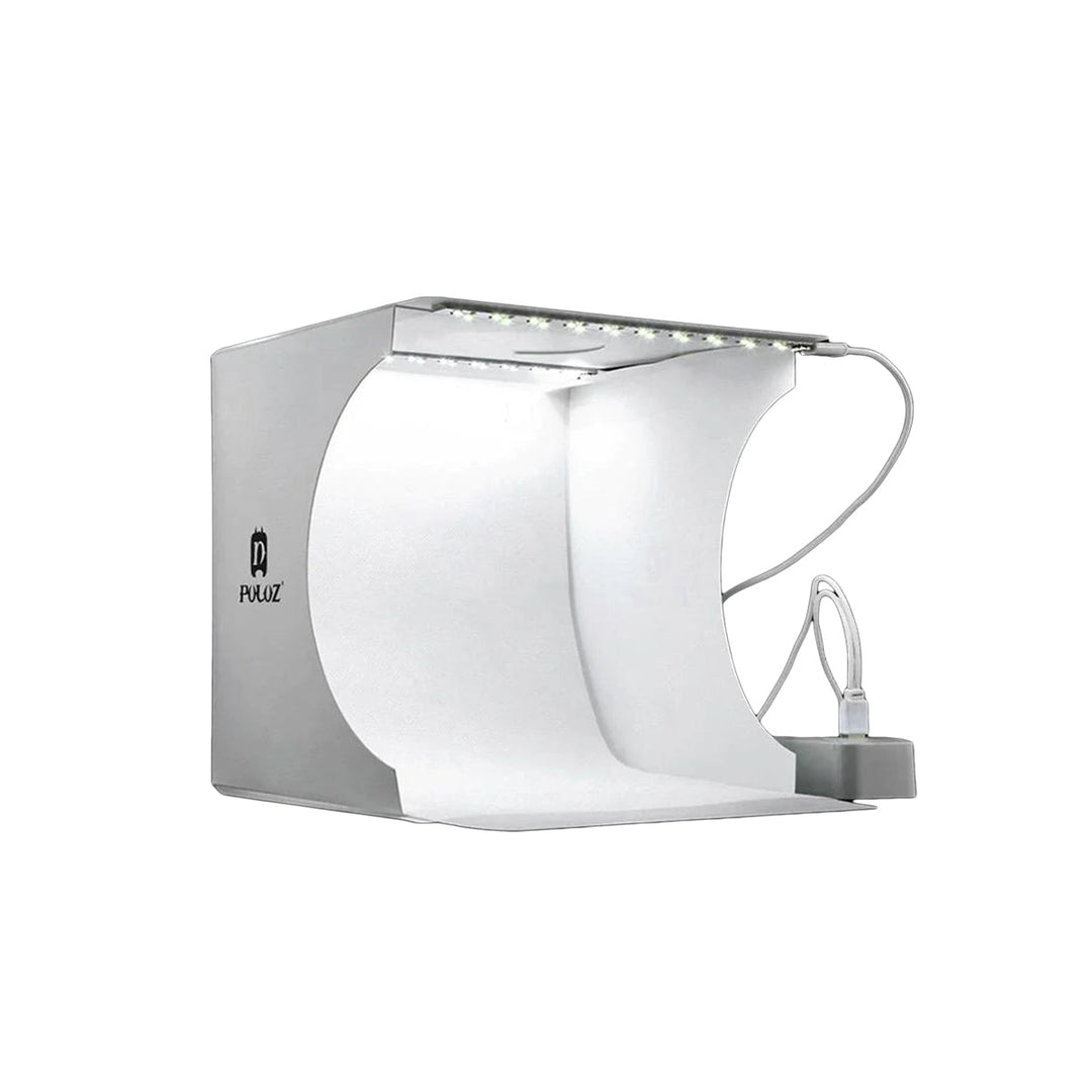 "Kompaktes tragbares Fotostudio mit LED-Licht: Weiße Box, darin hell beleuchtet, ideal für Produktfotografie Gadgets."
