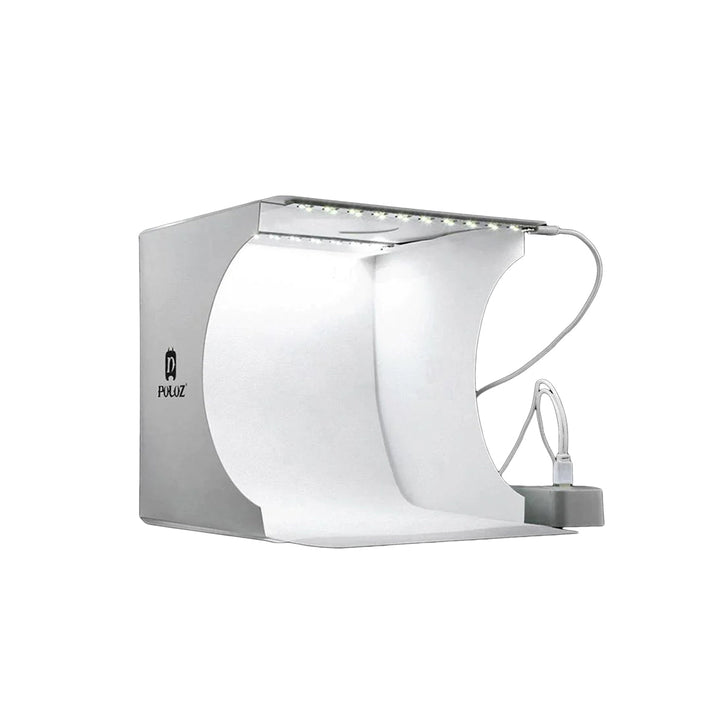 "Kompaktes tragbares Fotostudio mit LED-Licht: Weiße Box, darin hell beleuchtet, ideal für Produktfotografie Gadgets."