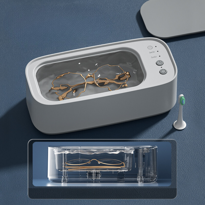 Kompaktes Ultraschallreinigungsgerät für Schmuck und Brillen, silberfarben, mit benutzerfreundlichem Design und moderner Tech