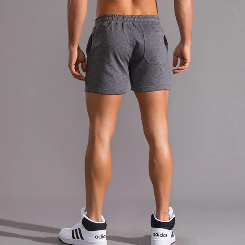 Lässige Herren Slim-Fit Shorts in Blau, moderne Passform, atmungsaktiv, mit Taschen, für Sommeranlässe ideal.