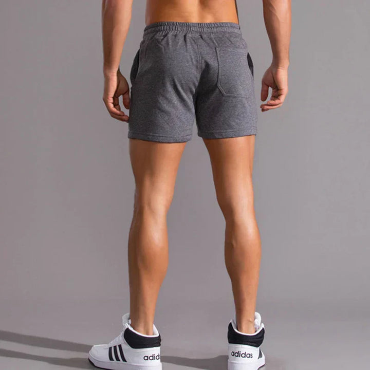 Lässige Herren Slim-Fit Shorts in Blau, moderne Passform, atmungsaktiv, mit Taschen, für Sommeranlässe ideal.