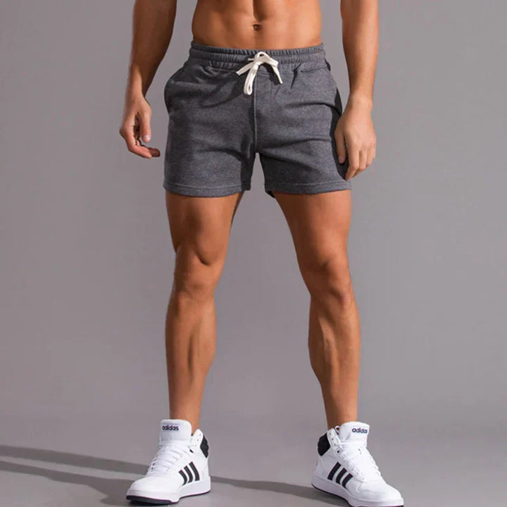 Lässige Herren Slim-Fit Shorts in Blau, moderne Passform, atmungsaktiv, mit Taschen, für Sommeranlässe ideal.