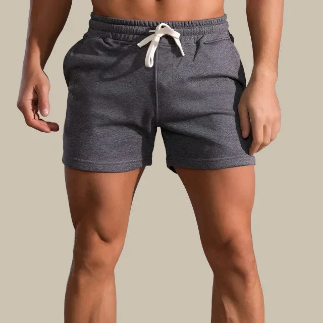 Lässige Herren Slim-Fit Shorts in Blau, moderne Passform, atmungsaktiv, mit Taschen, für Sommeranlässe ideal.