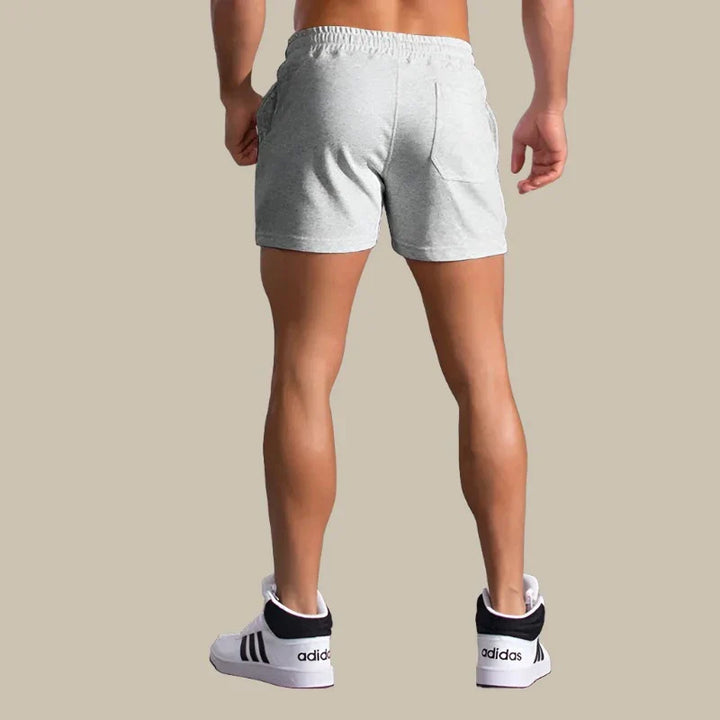 Lässige Herren Slim-Fit Shorts in Blau, moderne Passform, atmungsaktiv, mit Taschen, für Sommeranlässe ideal.