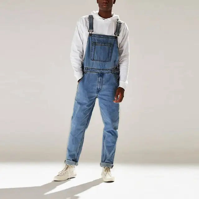 "Lässiger Denim Overall mit verstellbaren Trägern, Taschen und lockerer Passform in Blau, geeignet für stilvolle Freizeitlook