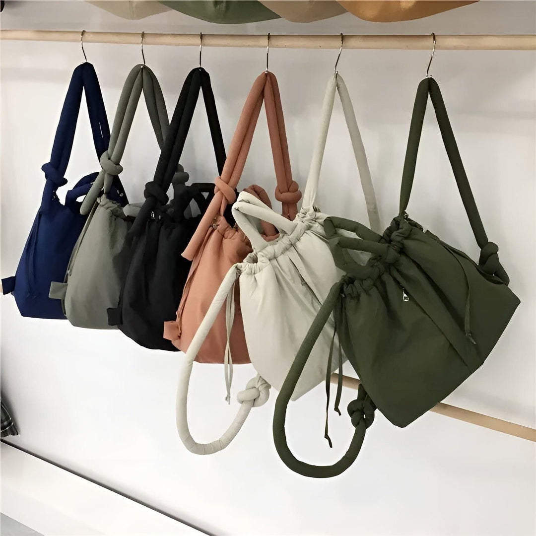 "Leichte Damen Pufferhandtasche mit stilvollem Design, ideal für jeden Anlass, in verschiedenen trendigen Farben erhältlich."