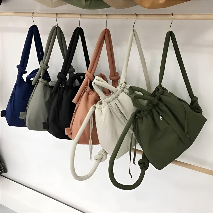 "Leichte Damen Pufferhandtasche mit stilvollem Design, ideal für jeden Anlass, in verschiedenen trendigen Farben erhältlich."