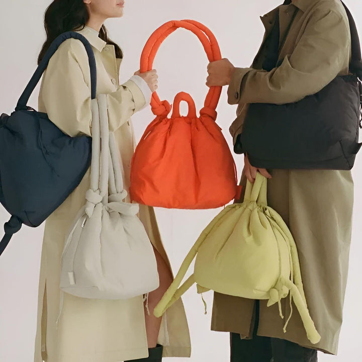 "Leichte Damen Pufferhandtasche mit stilvollem Design, ideal für jeden Anlass, in verschiedenen trendigen Farben erhältlich."