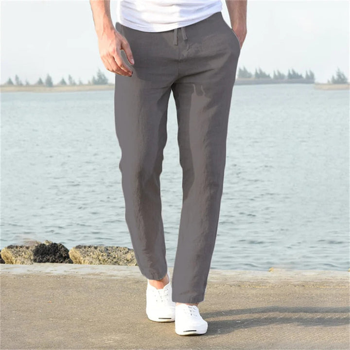 Leichte Herren Leinenhose, atmungsaktiv und bequem, beige Farbe, ideal für Sommer, lockerer Schnitt für lässigen Look.