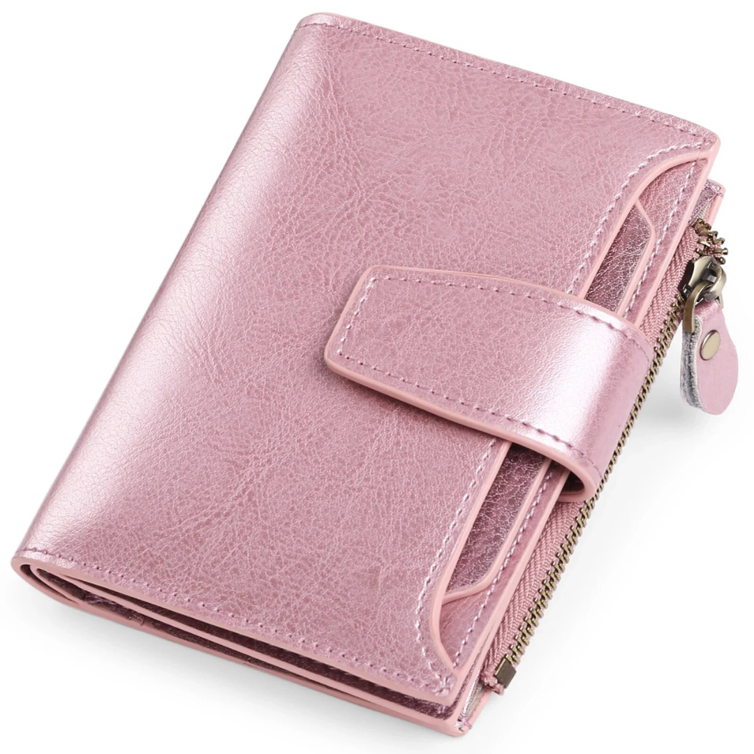 Rosa Leder-Geldbörse mit Reißverschluss und Druckknopf, elegant und kompakt.