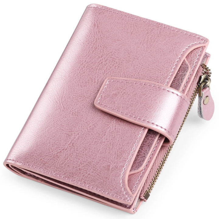 Rosa Leder-Geldbörse mit Reißverschluss und Druckknopf, elegant und kompakt.