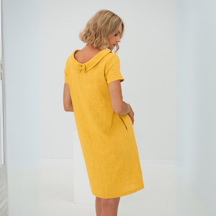 "Luftiges, atmungsaktives Leinenkleid in A-Linie, ideal für sommerliche Tage, zeitlose Eleganz für jede Gelegenheit."