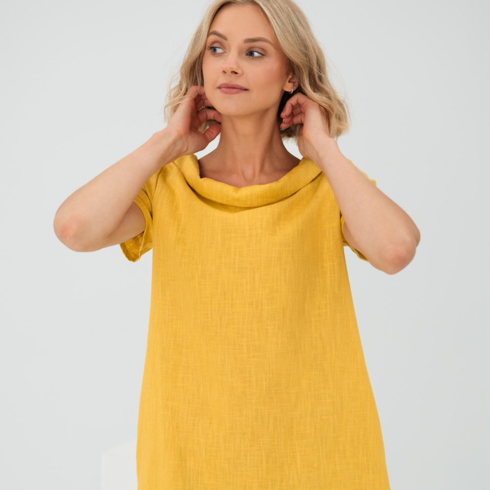 "Luftiges, atmungsaktives Leinenkleid in A-Linie, ideal für sommerliche Tage, zeitlose Eleganz für jede Gelegenheit."