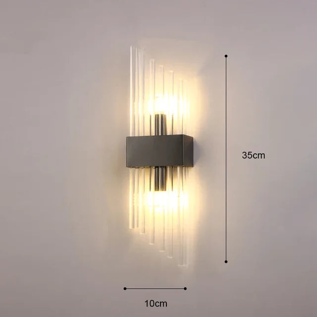 Luxuriöse LED-Wandleuchte mit goldenem Finish und opulentem Design, ideal für elegantes, stimmungsvolles Ambiente.