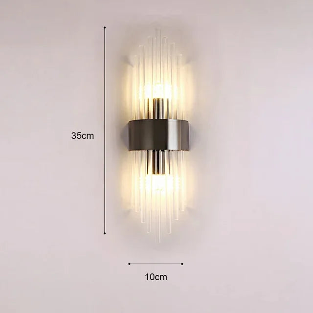 Luxuriöse LED-Wandleuchte mit goldenem Finish und opulentem Design, ideal für elegantes, stimmungsvolles Ambiente.