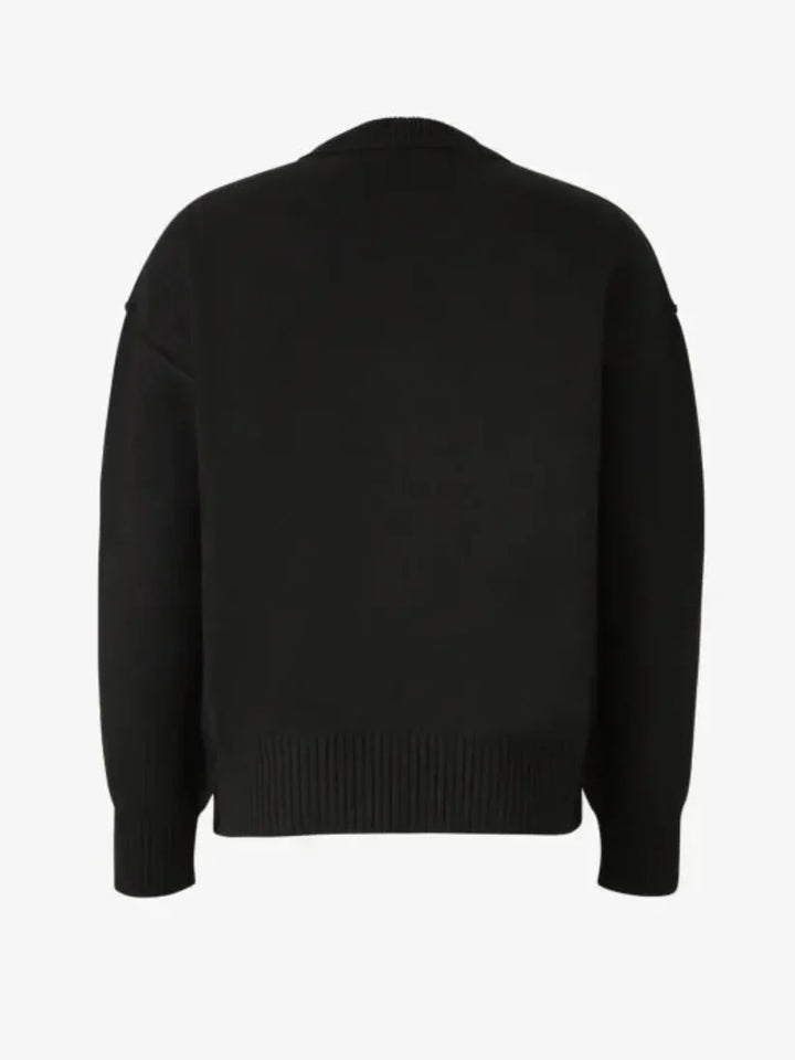 Luxus Unisex-Pullover in Grau mit Herz-Design aus 100% Wolle, edel und komfortabel, zentral platziertes ikonisches Herz.