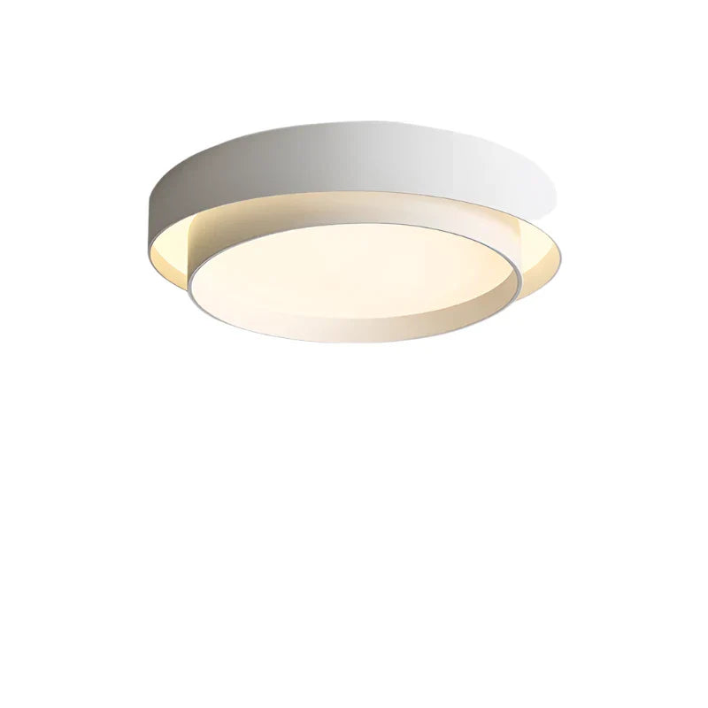 Minimalistische LED Deckenleuchte in Weiß, runde Form, zeitgenössisches Design, energieeffiziente Beleuchtung, Wohnzimmer.