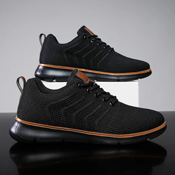 "Moderne Herren Sneaker mit Mesh-Design, atmungsaktiv, schwarz-weiß, ideal für Sport und Freizeit, hohe Komfortdämpfung"