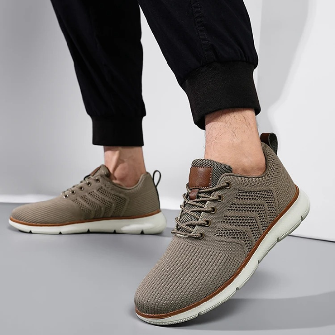"Moderne Herren Sneaker mit Mesh-Design, atmungsaktiv, schwarz-weiß, ideal für Sport und Freizeit, hohe Komfortdämpfung"