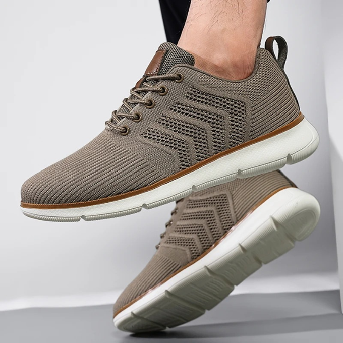 "Moderne Herren Sneaker mit Mesh-Design, atmungsaktiv, schwarz-weiß, ideal für Sport und Freizeit, hohe Komfortdämpfung"