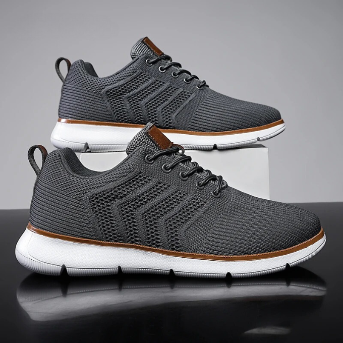 "Moderne Herren Sneaker mit Mesh-Design, atmungsaktiv, schwarz-weiß, ideal für Sport und Freizeit, hohe Komfortdämpfung"