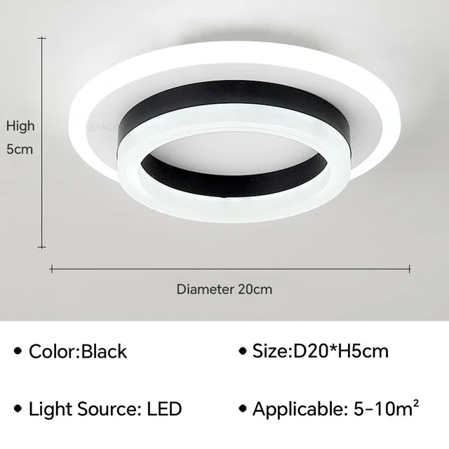 Moderne LED-Deckenleuchte mit minimalistischer, flacher Silhouette und eleganten Metall- und Glaselementen.
