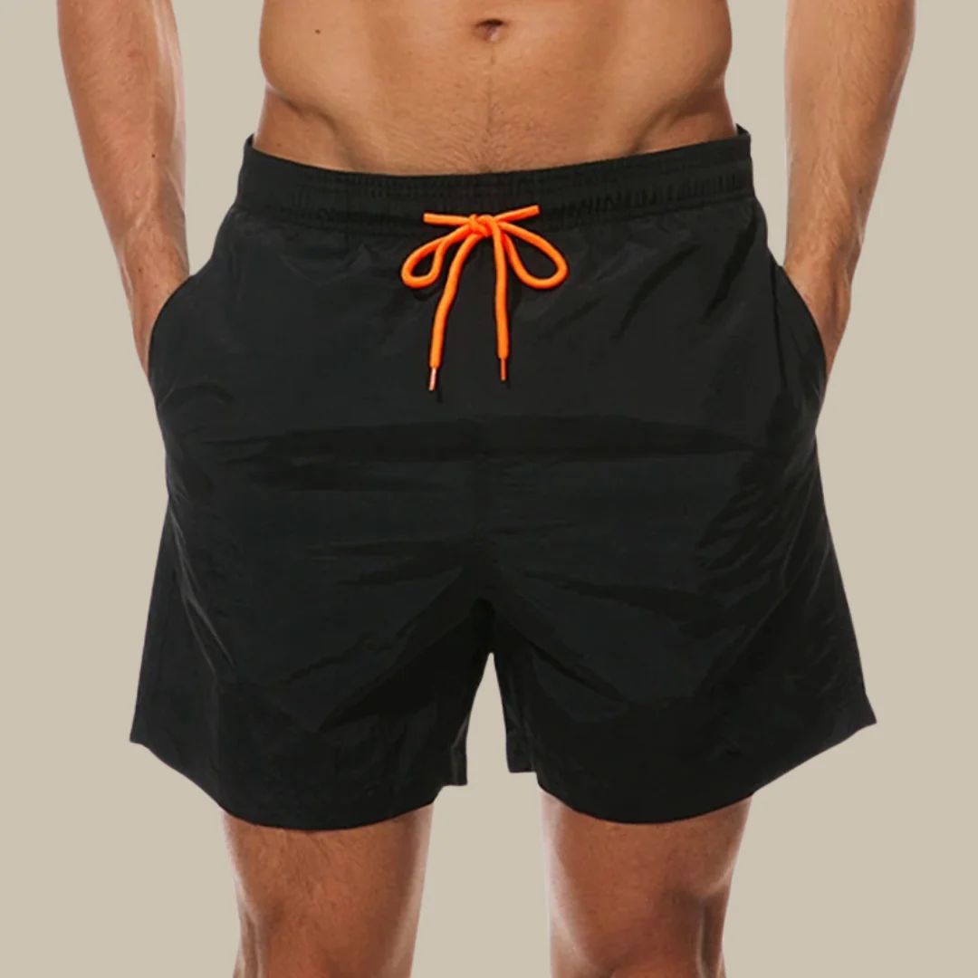 "Modische Herren Badehose, schnelltrocknend, blaue Farbe, elegante Passform für sportliche und entspannte Sommeraktivitäten"