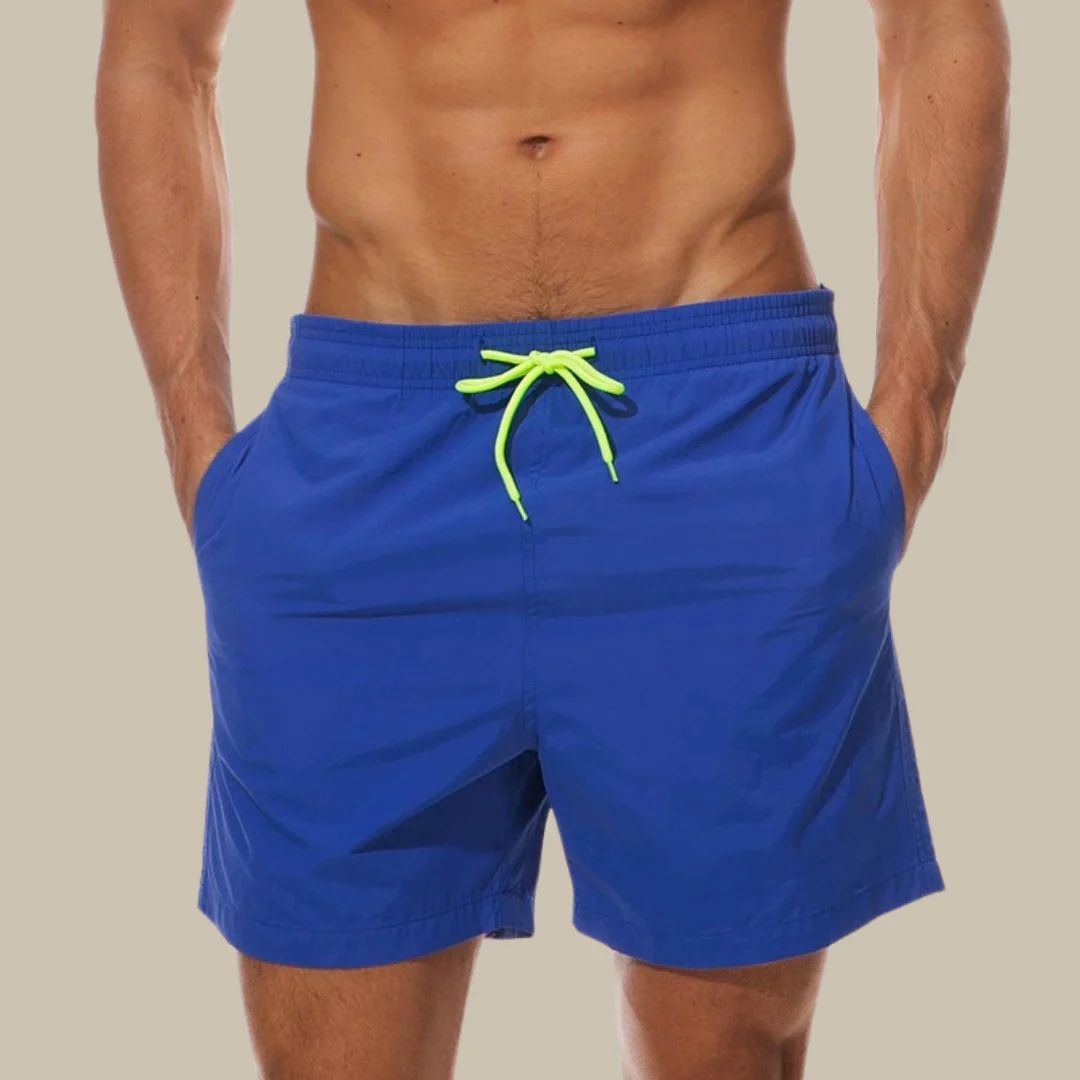 "Modische Herren Badehose, schnelltrocknend, blaue Farbe, elegante Passform für sportliche und entspannte Sommeraktivitäten"