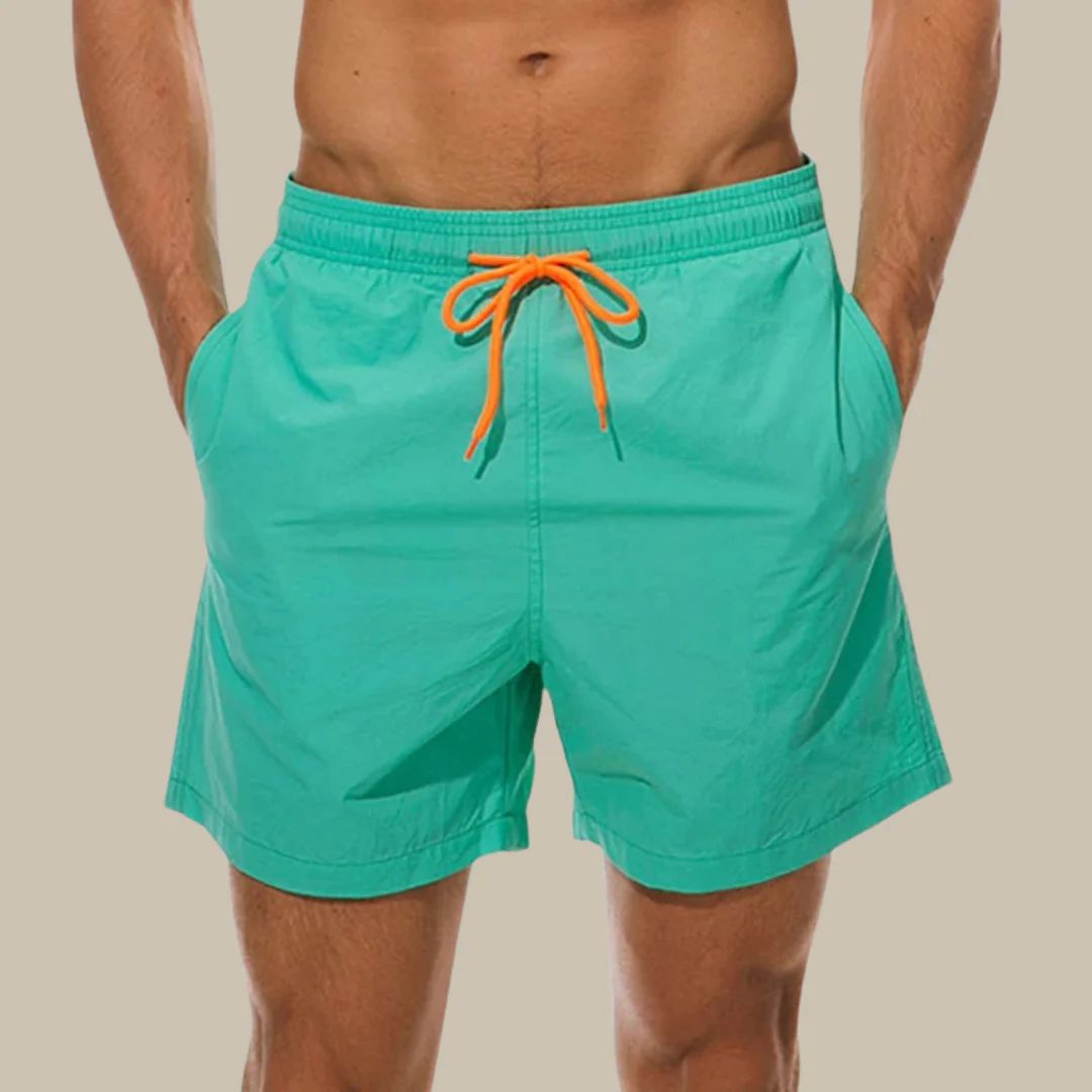 "Modische Herren Badehose, schnelltrocknend, blaue Farbe, elegante Passform für sportliche und entspannte Sommeraktivitäten"