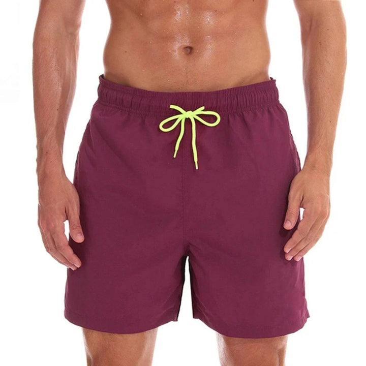 "Modische Herren Badehose, schnelltrocknend, blaue Farbe, elegante Passform für sportliche und entspannte Sommeraktivitäten"