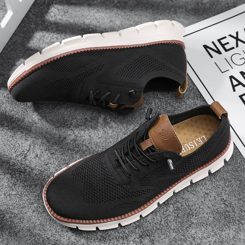 "Modische, leichte Herren-Sneaker, schwarz-graues Design, für Komfort und Stil."