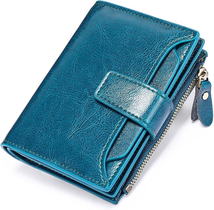 Blaue Leder-Geldbörse mit Reißverschluss und Druckknopf, stilvoll und kompakt.