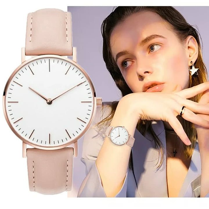 Damenarmbanduhr, roségold, minimalistisches Design, weißes Zifferblatt, Lederarmband.