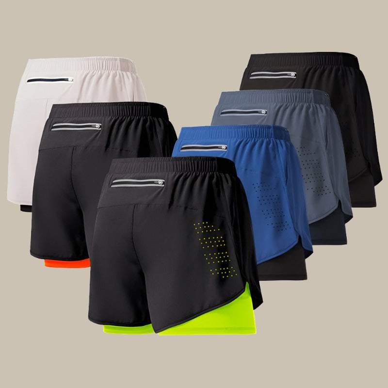 "Schnelltrocknende Herrenlaufshorts, dunkelgrau, mit Taschen und Mesh-Einsätzen für Atmungsaktivität und Bewegungsfreiheit."