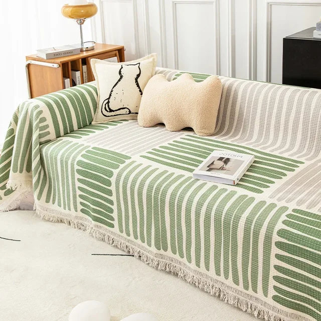 "Sofabezug mit Quasten im skandinavischen Stil, pflegeleichtes Design für elegante Wohnzimmergestaltung."