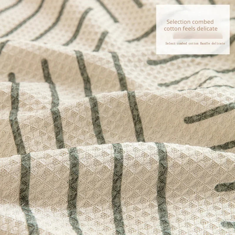 "Sofabezug mit Quasten im skandinavischen Stil, pflegeleichtes Design für elegante Wohnzimmergestaltung."