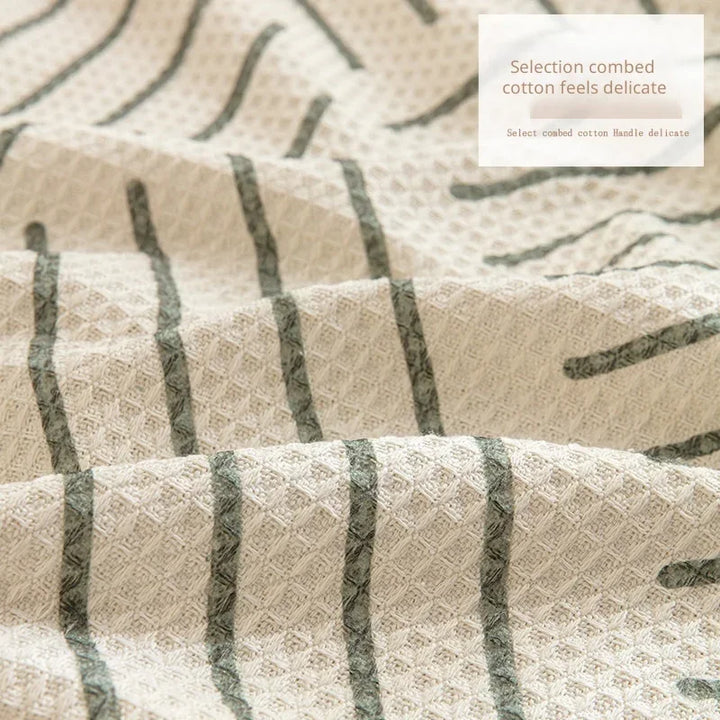 "Sofabezug mit Quasten im skandinavischen Stil, pflegeleichtes Design für elegante Wohnzimmergestaltung."