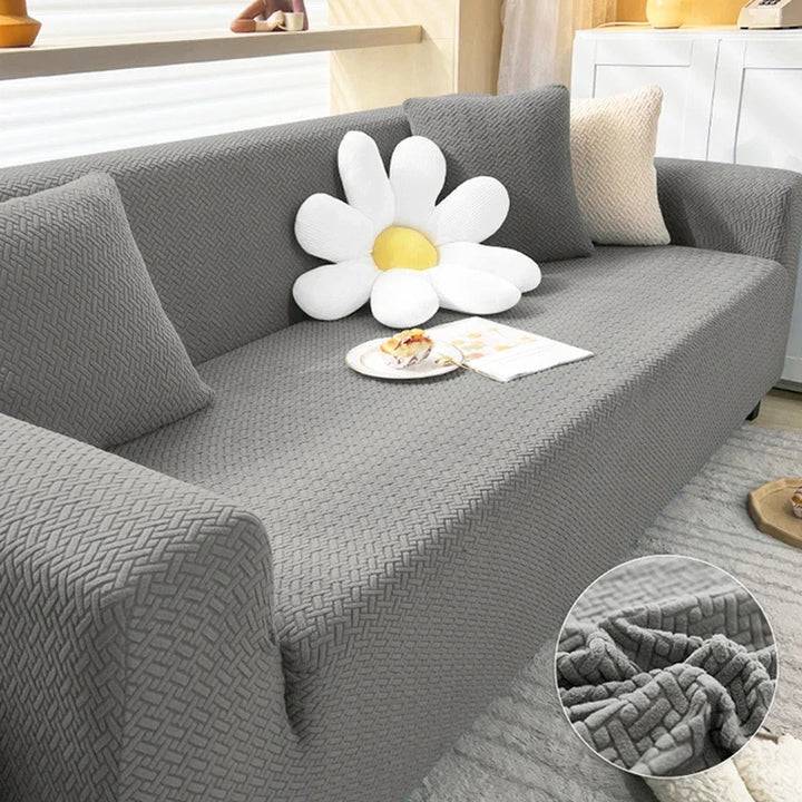 "SofaStyle Premium Sofabezug in Dunkelgrau, elastisch, passt auf alle Sofa-Typen, schützt vor Flecken und Kratzern."