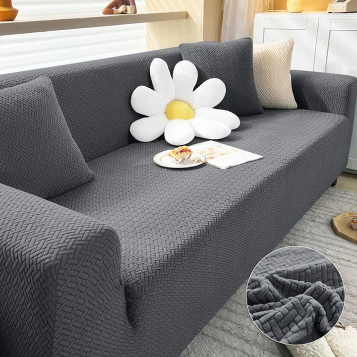 "SofaStyle Premium Sofabezug in Dunkelgrau, elastisch, passt auf alle Sofa-Typen, schützt vor Flecken und Kratzern."