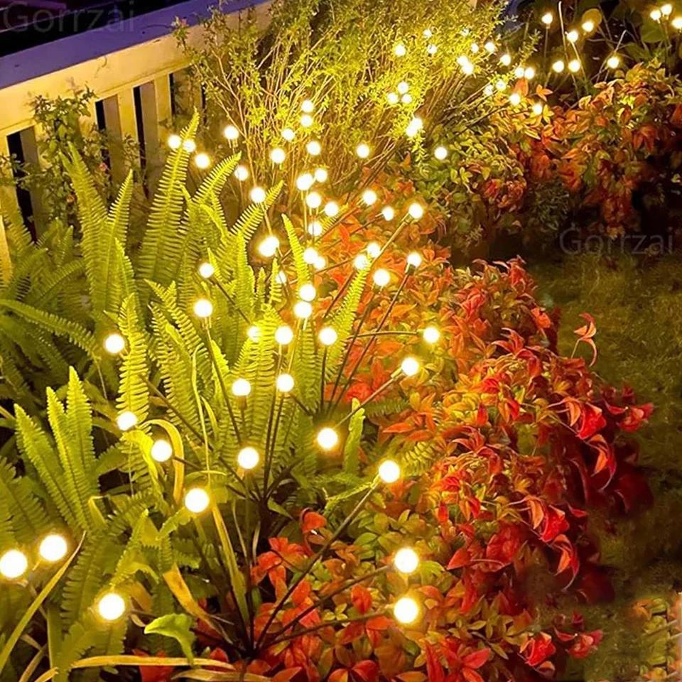 Solar Gartenlichter leuchten warm im Garten, wetterfest und flexibel biegbar, ideal für romantische Außenbeleuchtung.