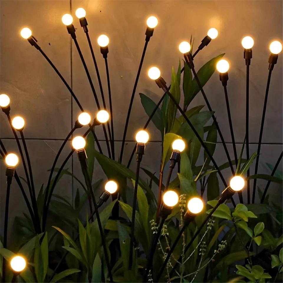 Solar Gartenlichter leuchten warm im Garten, wetterfest und flexibel biegbar, ideal für romantische Außenbeleuchtung.