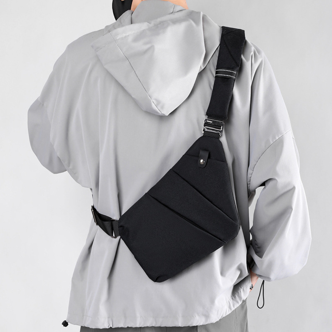 "Stilvolle Anti-Diebstahl Umhängetasche für Damen, elegant in Dunkelgrau mit versteckten Fächern und verstellbarem Riemen."