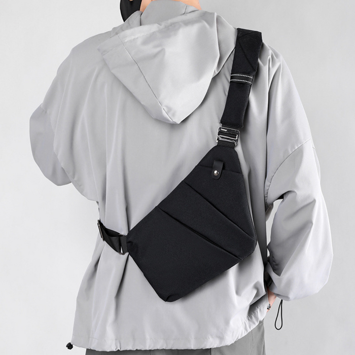 "Stilvolle Anti-Diebstahl Umhängetasche für Damen, elegant in Dunkelgrau mit versteckten Fächern und verstellbarem Riemen."