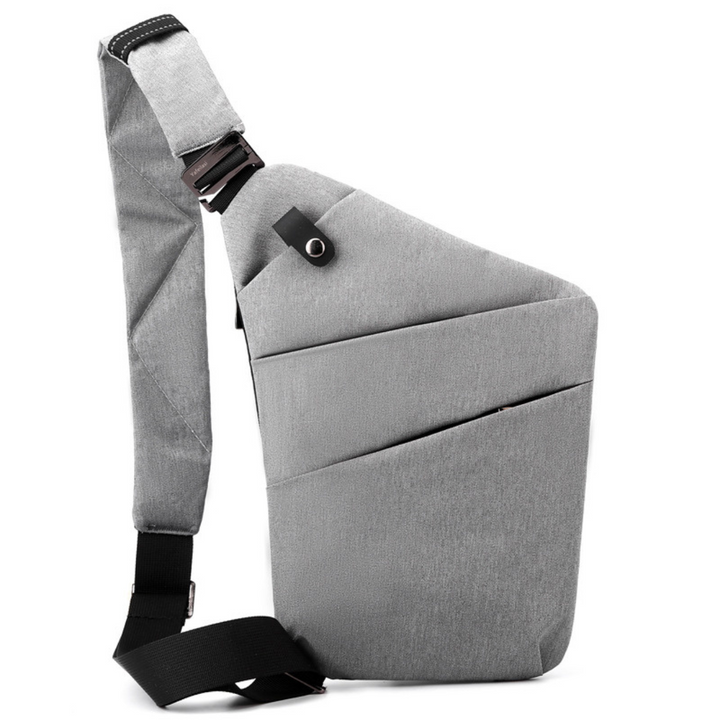 "Stilvolle Anti-Diebstahl Umhängetasche für Damen, elegant in Dunkelgrau mit versteckten Fächern und verstellbarem Riemen."