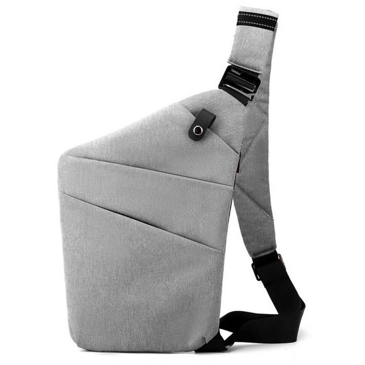 "Stilvolle Anti-Diebstahl Umhängetasche für Damen, elegant in Dunkelgrau mit versteckten Fächern und verstellbarem Riemen."