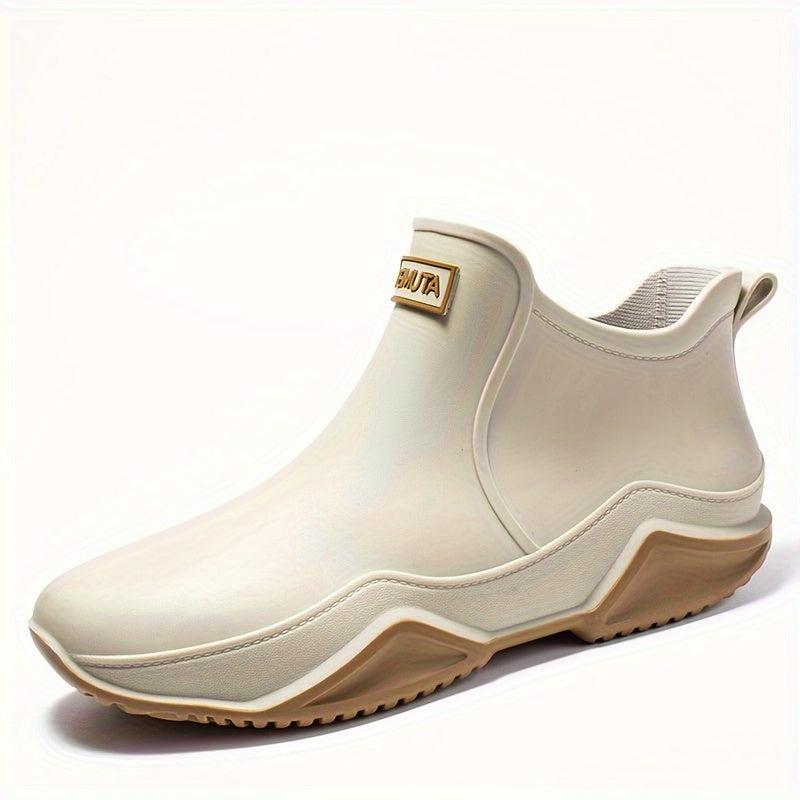 Stilvolle Damen-Regenstiefel, wasserdicht, minimalistisches Design, Slip-On-Stil, ideal für regnerische Tage.
